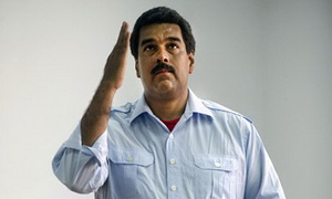 nicolas maduro gestures as he casts his vote in an election that has made him president